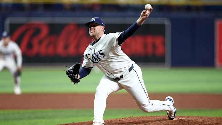 Sep 19, 2024; St. Petersburg, Florida, USA; Tampa Bay Rays pitcher Garrett Cleavinger (60) throws a pitch against the Boston Red Sox in the ninth inning at Tropicana Field.