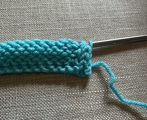 Knitting stitches on needle
