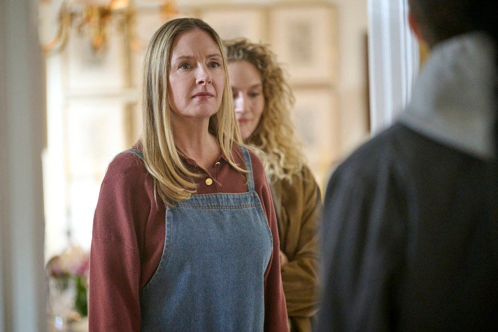 LINE OF FIRE -- "Pilot" Episode 101 -- Pictured: Hope Davis as Jane Hollingsworth, in the living room at her home with her family LINE OF FIRE -- "Pilot" Episode 101 -- Pictured: Hope Davis as Jane Hollingsworth, in the living room at her home with her family