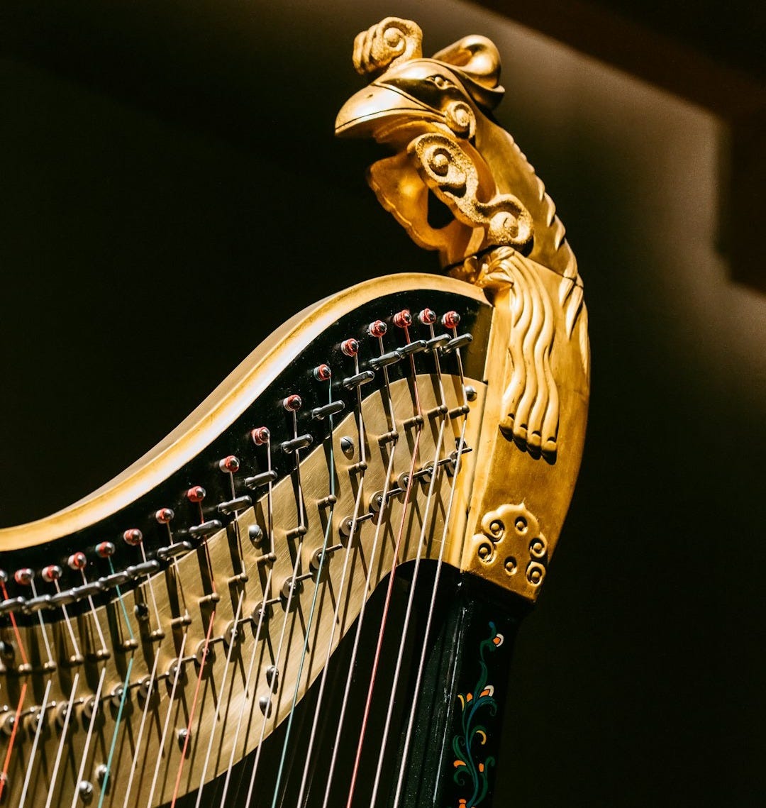 gold and black musical instrument