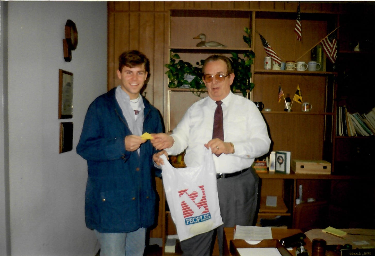 Shawn Collins has College Park City Manager Don Byrd select the raffle winner. Shawn Collins has College Park City Manager Don Byrd select the raffle winner.