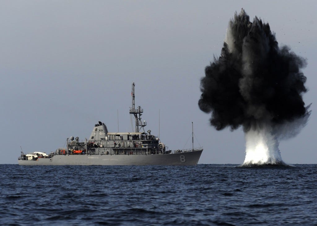 A demolition charge detonates 1,500 meters from the Avenger-class mine countermeasures ship USS Scout. (Mass Communication Specialist 1st Class Joshua Lee Kelsey/U.S. Navy Photo) A demolition charge detonates 1,500 meters from the Avenger-class mine countermeasures ship USS Scout. (Mass Communication Specialist 1st Class Joshua Lee Kelsey/U.S. Navy Photo)