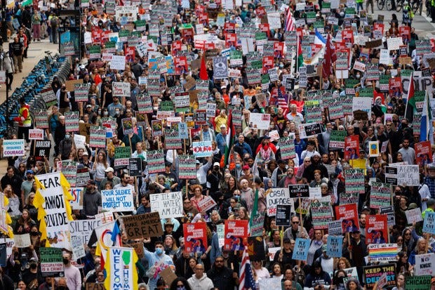 People march in the Loop to protest President Donald Trump's intent to increase immigration enforcement actions in the city and deploy the National Guard, Sept. 6, 2025, in Chicago. (Armando L. Sanchez/Chicago Tribune)