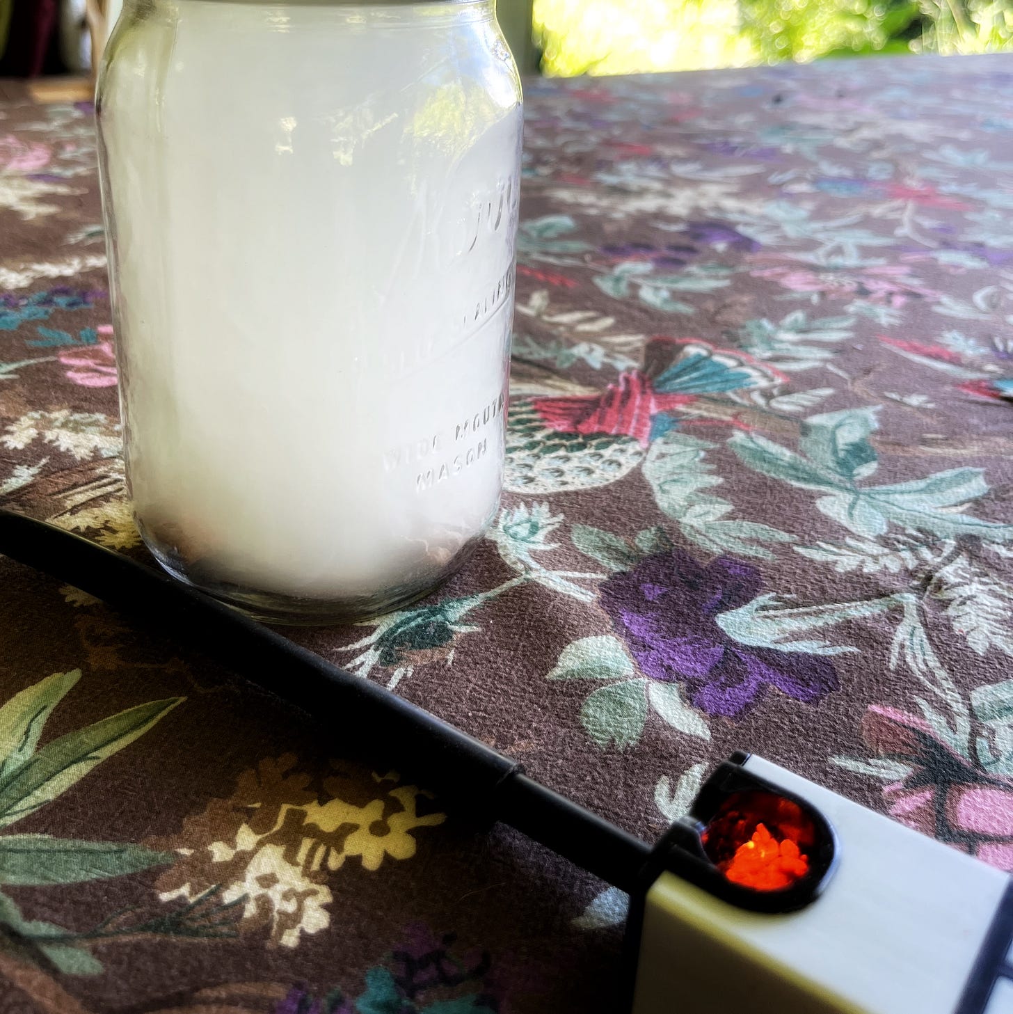 Smoke filled jar with small smoker device