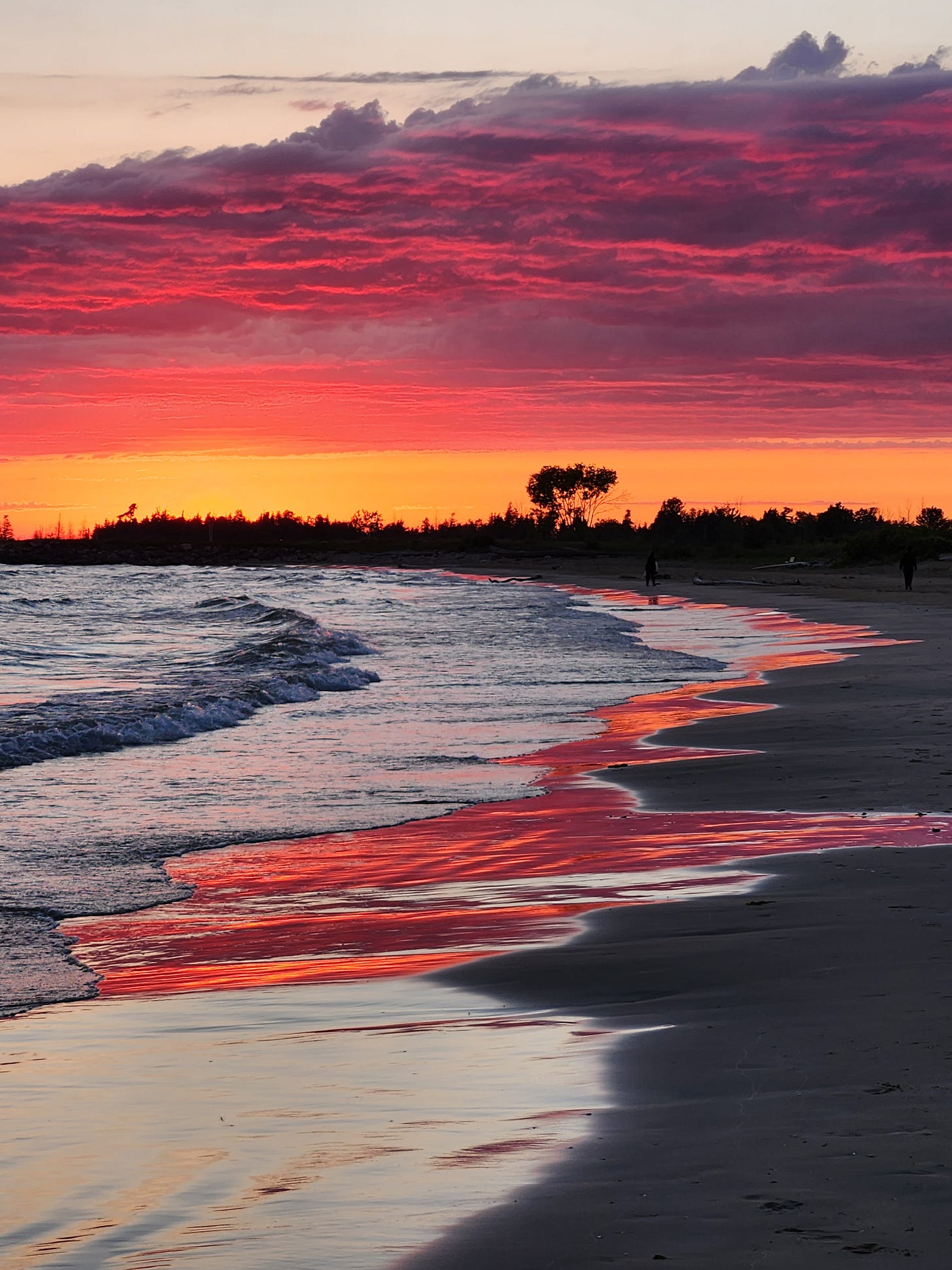 Vibrant orangey-red sunset at Sauble Beach. Photo by Kelly HIll Vibrant orangey-red sunset at Sauble Beach. Photo by Kelly HIll