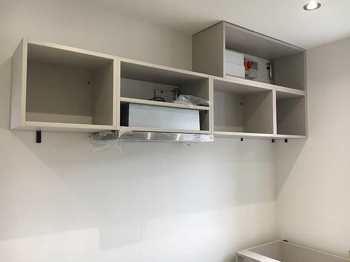 Modular wall units showing before and after the doors have been added