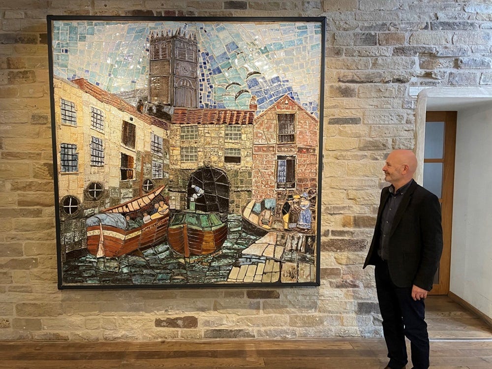 Paul Egan with the mural by Grete Marks Paul Egan with the mural by Grete Marks