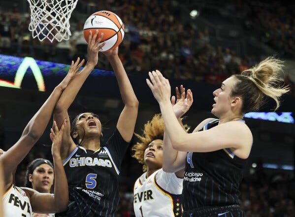Angel Reese leads Sky to 88-87 win over Fever despite Caitlin Clark's  franchise-record 13 assists | AP News