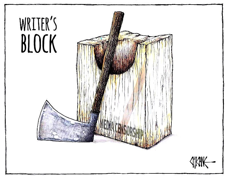 'Writer's block'-an axe and a beheading block of wood, labelled 'media censorship.' 'Writer's block'-an axe and a beheading block of wood, labelled 'media censorship.'