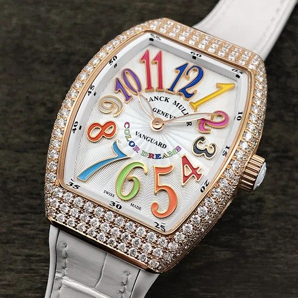  Rows of diamonds adorn the rose gold Lady Vanguard Color Dreams. 