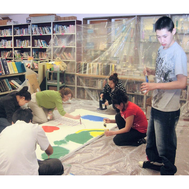 The library-turned-studio in Akiuk School & a photo of the snowbanks formed from the blizzard.