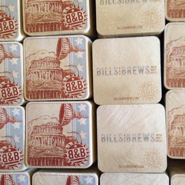 Stacks of red white and blue Bills and Brews with Matt Laslo coasters Stacks of red white and blue Bills and Brews with Matt Laslo coasters
