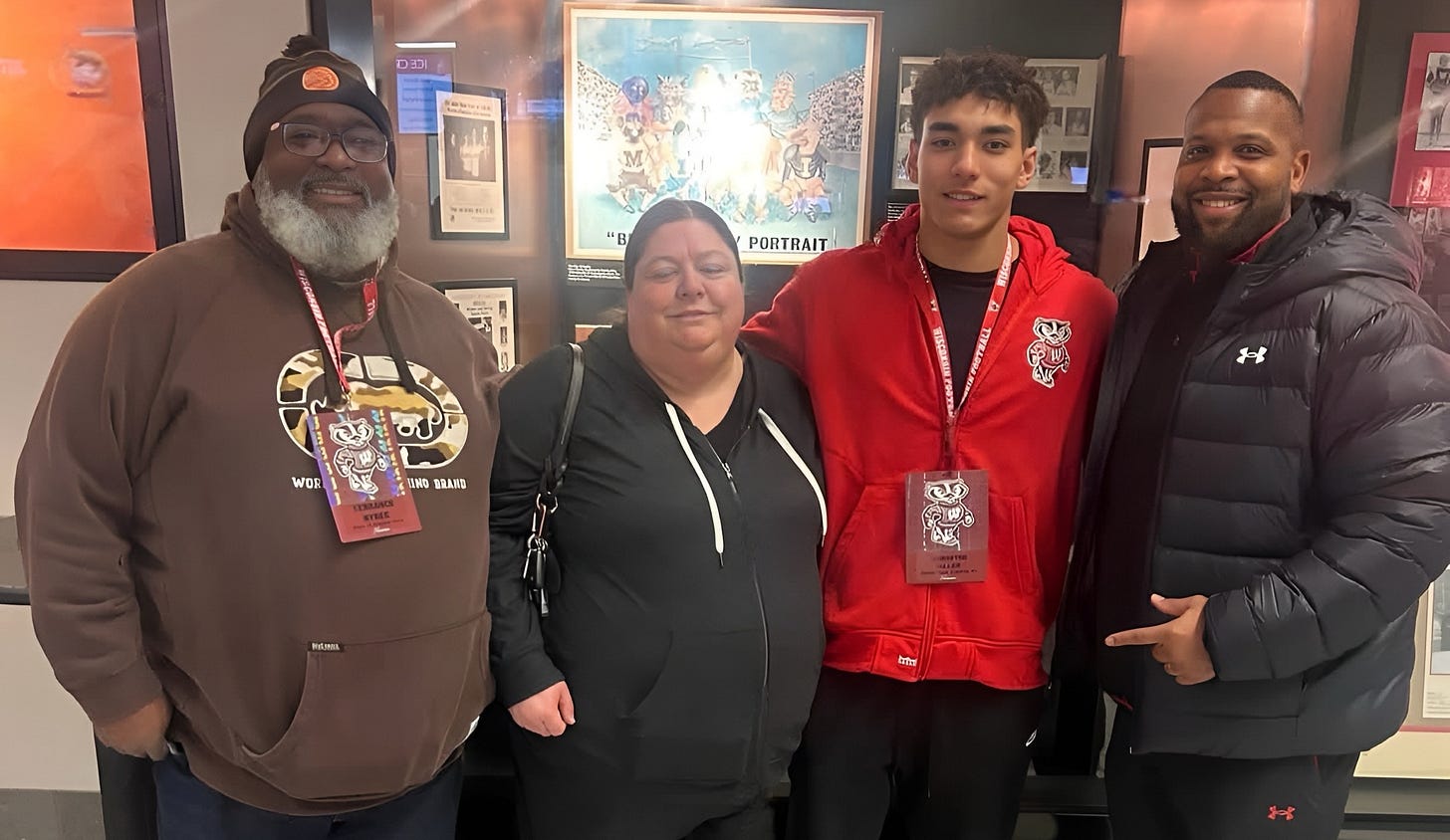 Wisconsin Badgers commit Kingston Allen stands with running backs coach Jayden Everett during a recruiting visit. 