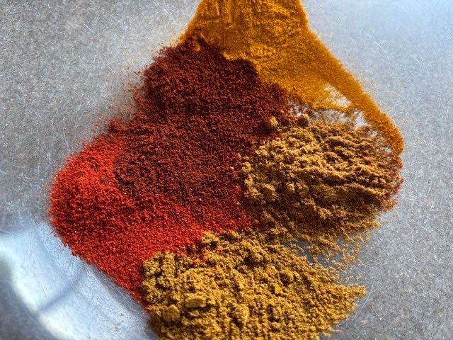 Love the colour of spices laid out - Chicken Curry