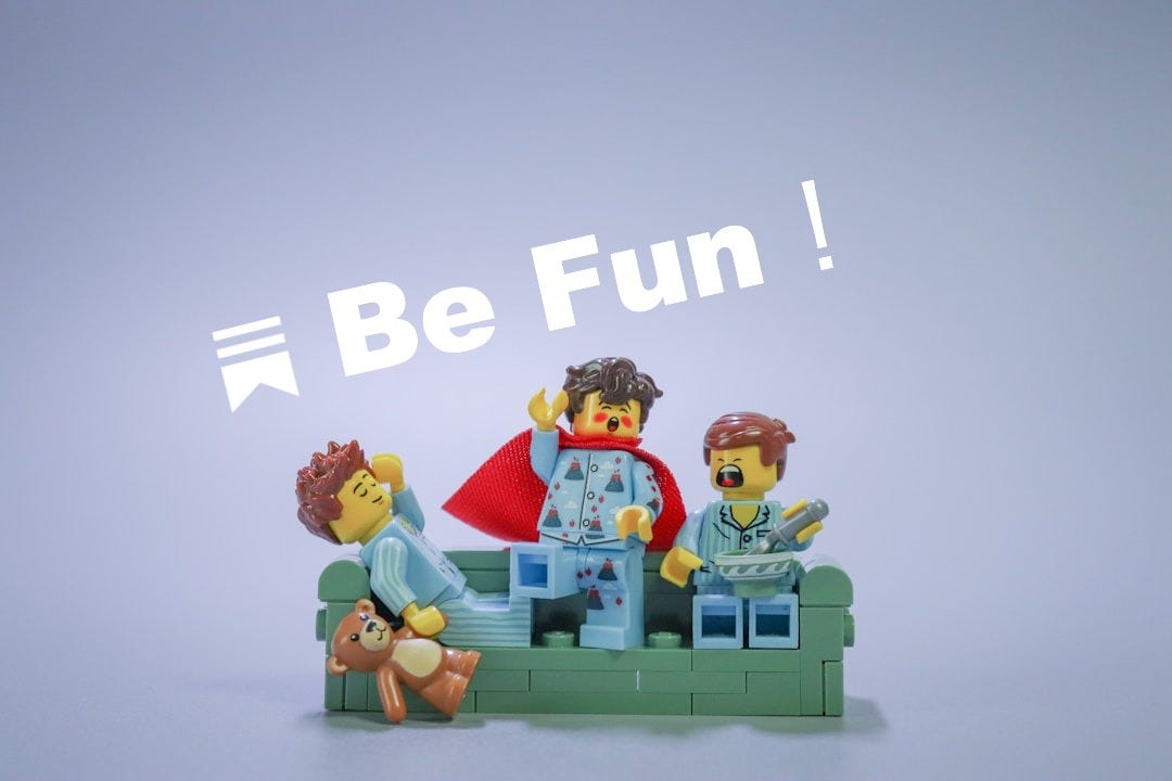 a group of lego figures sitting on top of a table a group of lego figures sitting on top of a table