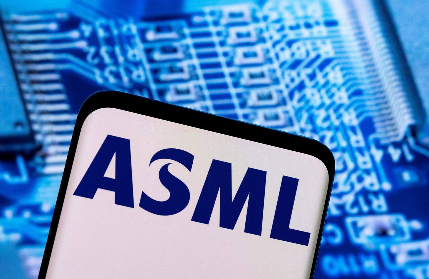 ASML launches 12 bln euro buyback, upgrades 2025 forecast | Reuters