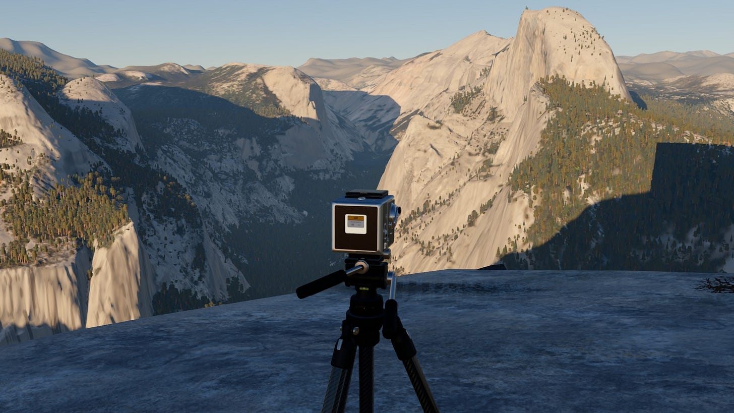 A medium-format camera on a tripod at Glacier Point, with Half Dome and the high country behind it. A medium-format camera on a tripod at Glacier Point, with Half Dome and the high country behind it.