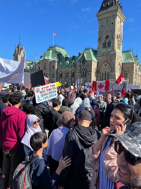 Parents and grandparents with children protested against gender ideology being forced on them in Canadian Schools. The parents and children took Parliament Hill as counter-protestors were held back on the other side of Wellington Street.