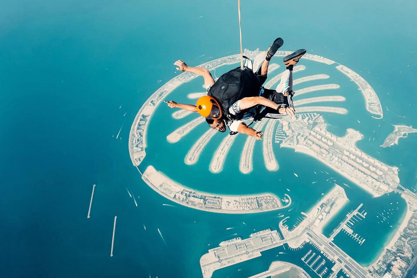 Epic skydive over Dubai’s Palm Jumeirah - dubaiparasailing.com
