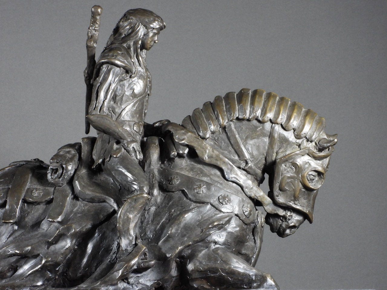 Detail of Spirit Warrior, cast bronze sculpture of a warrior woman on her warhorse