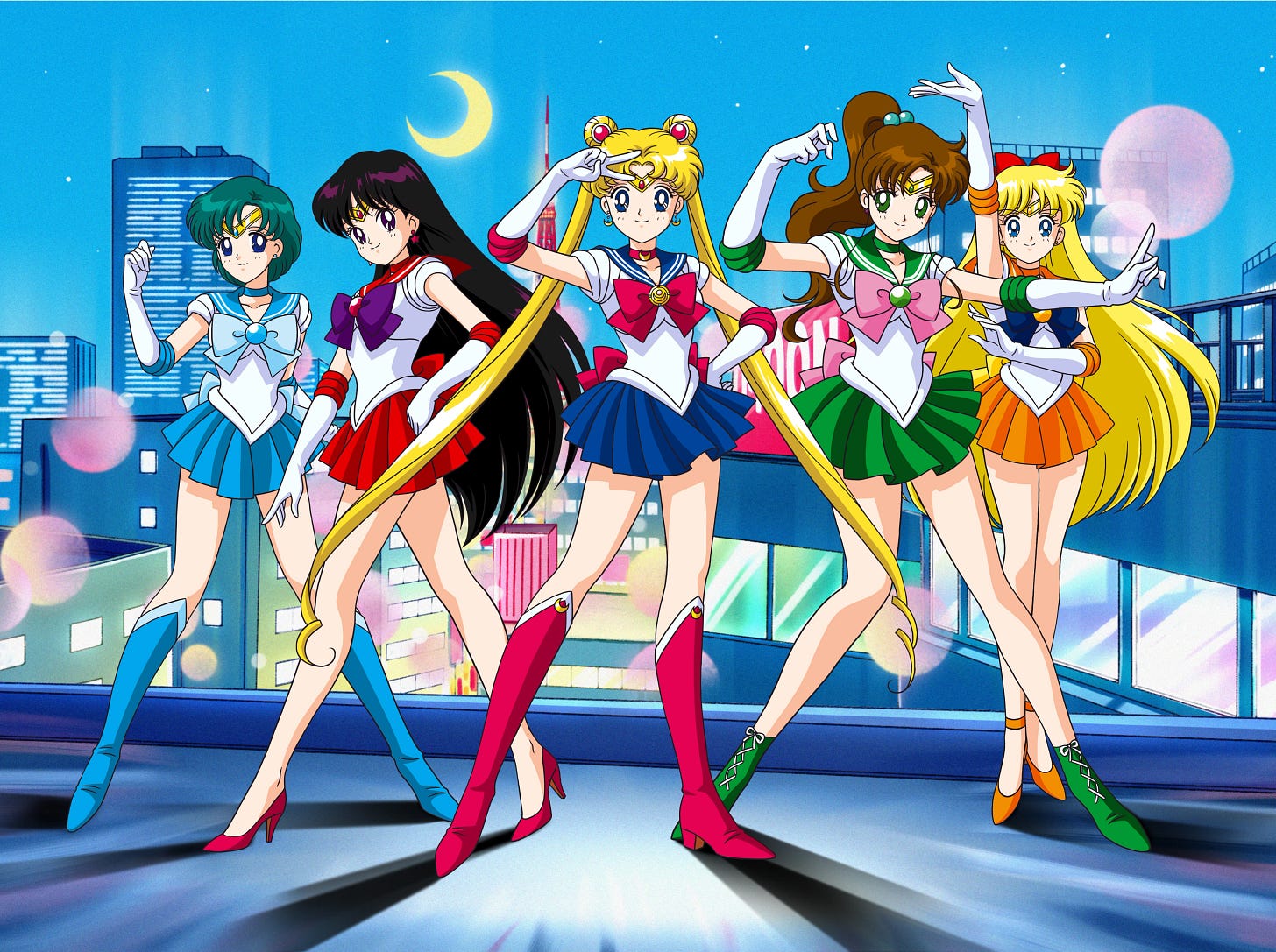 Sailor Mercury, Sailor Mars, Sailor Moon, Sailor Jupiter, and Sailor Venus posing on a rooftop