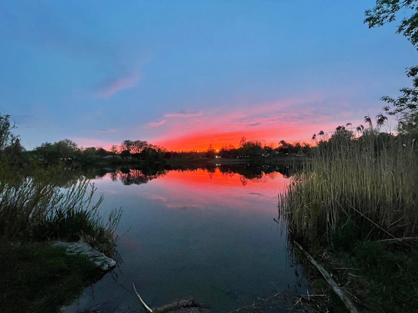A sunset reflecting on a lake