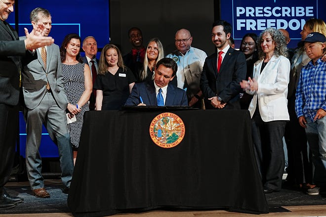 Florida Gov. DeSantis signs bill to outlaw COVID-19 mandates
