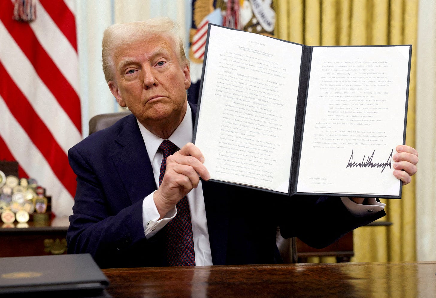 Trump signing an executive order for crypto