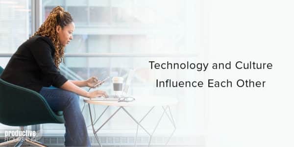 Black woman sitting at a desk. Text overlay: Technology and Culture Influence Each Other