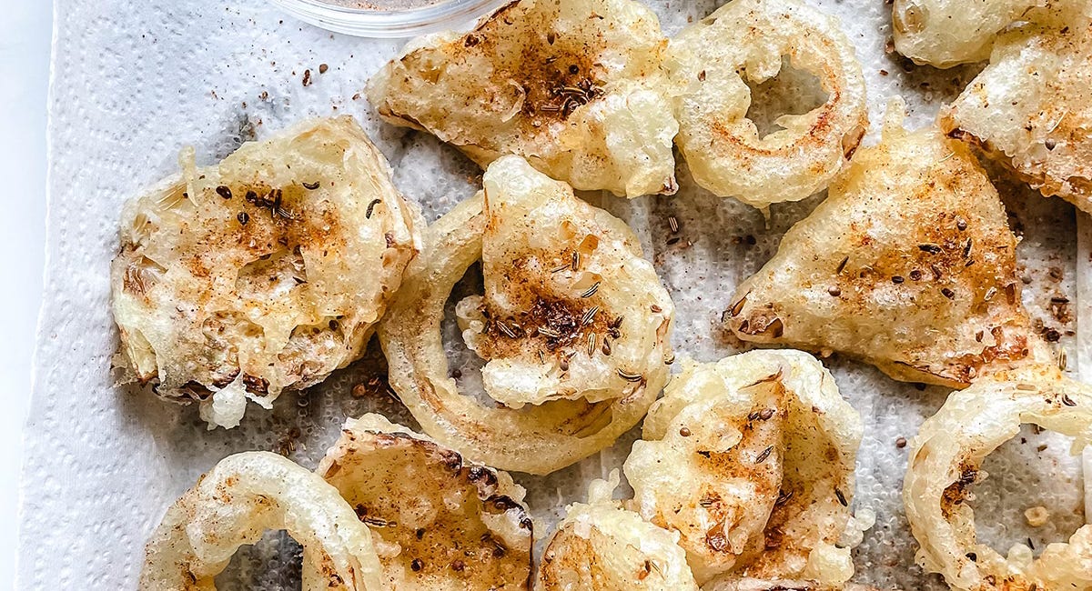 Crispy cabbage and onion tempura, seasoned with a zesty, garlic, fennel spice mix.
