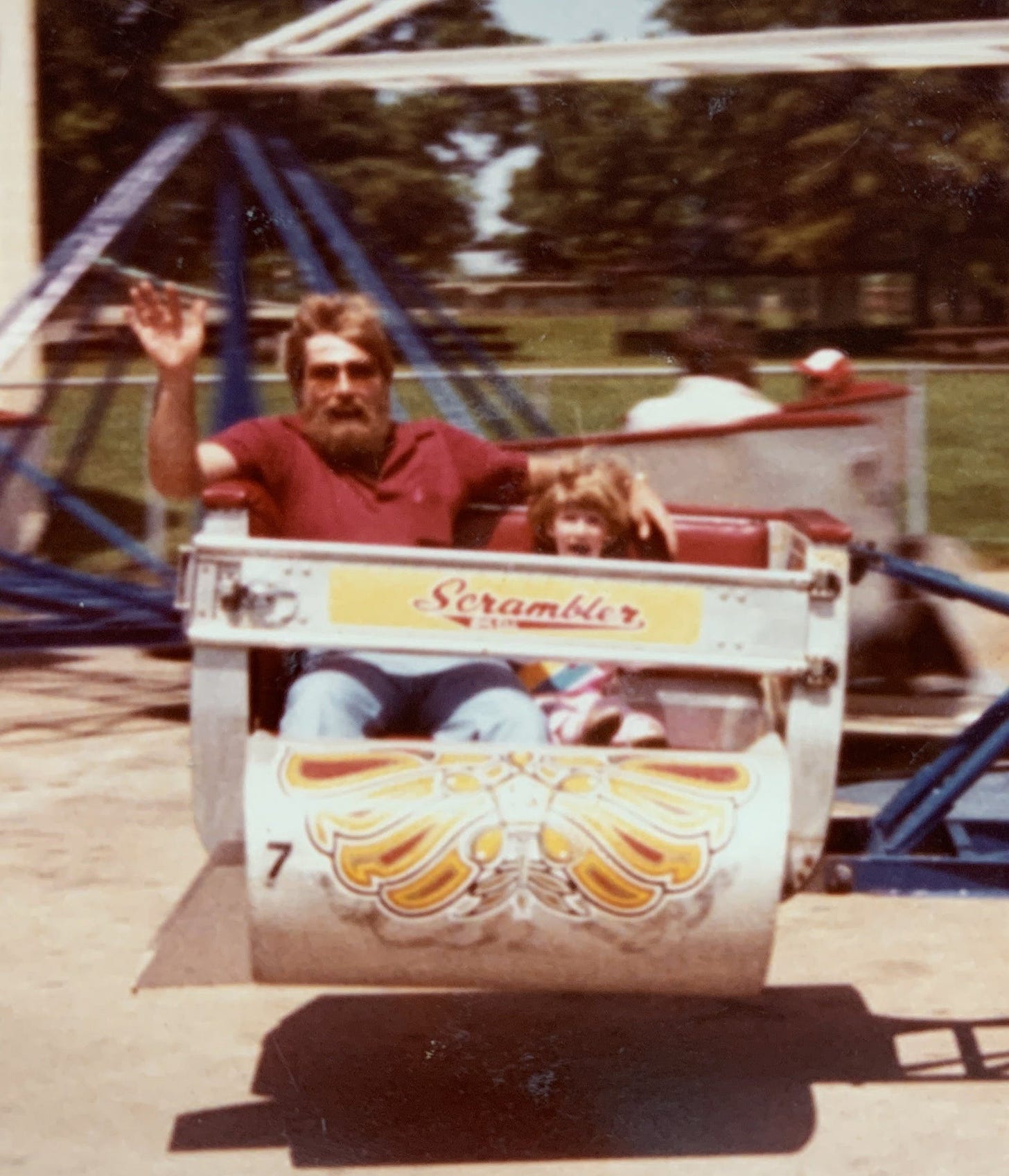 Lisa and Dad on the Scrambler