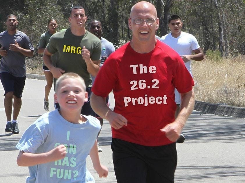 A person and a child running Description automatically generated with medium confidence A person and a child running Description automatically generated with medium confidence