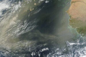 Tan-toned dust pulsed from the Sahara Desert and over the Atlantic Ocean in early May 2025.