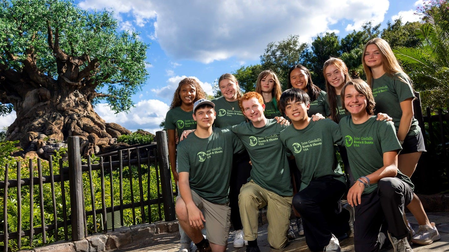 Youth conservation leaders at the Tree of Life in Disney's Animal Kingdom. Image: Disney