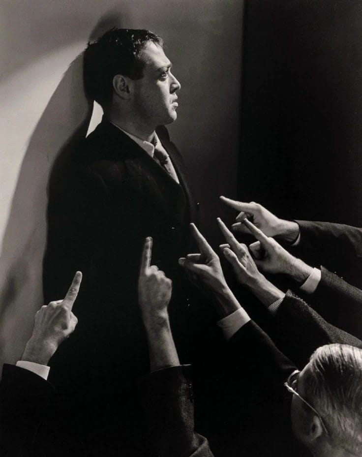 This may contain: black and white photograph of five people reaching out their hands