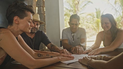 Signing the papers with Tara and Andrés, co-founders of MUSA