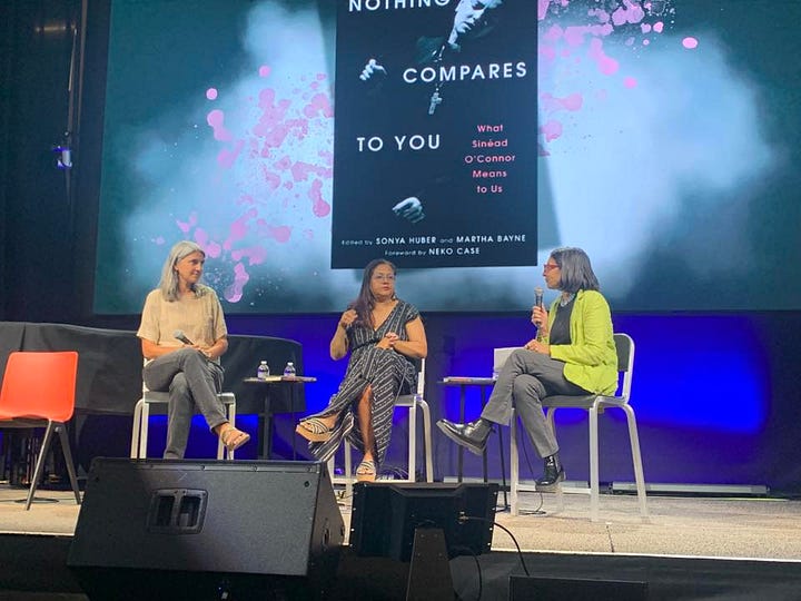 Top two pics are me on stage with Nalini Jones and Sharbari Ahmed, with book cover in the background, bottom left is a shot of me on WGN witha headshot of Sinéad, and the bottom right is a beautiful cover of Chicago Sun Times art section with Sinéad smiling, wreathed in a colorful halo
