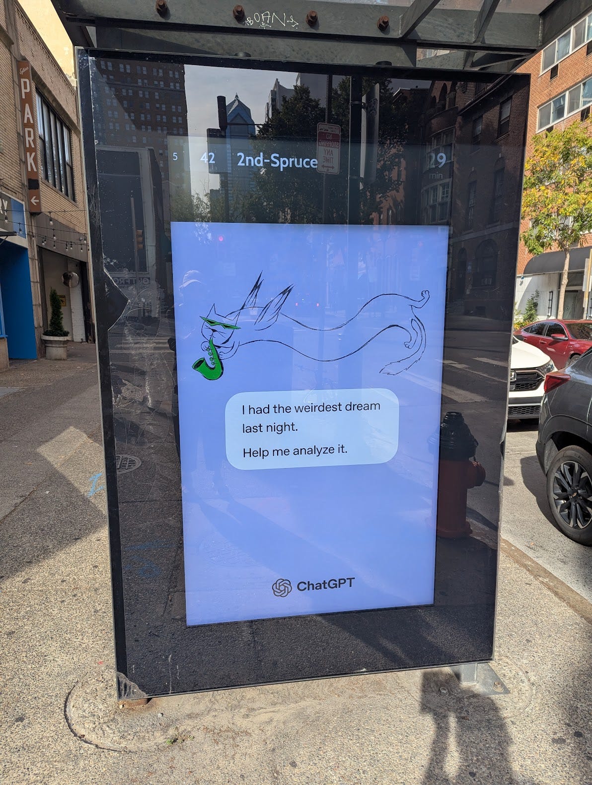 Ad for ChatGPT reads "I had the weirdest dream last night. Help me analyze it."