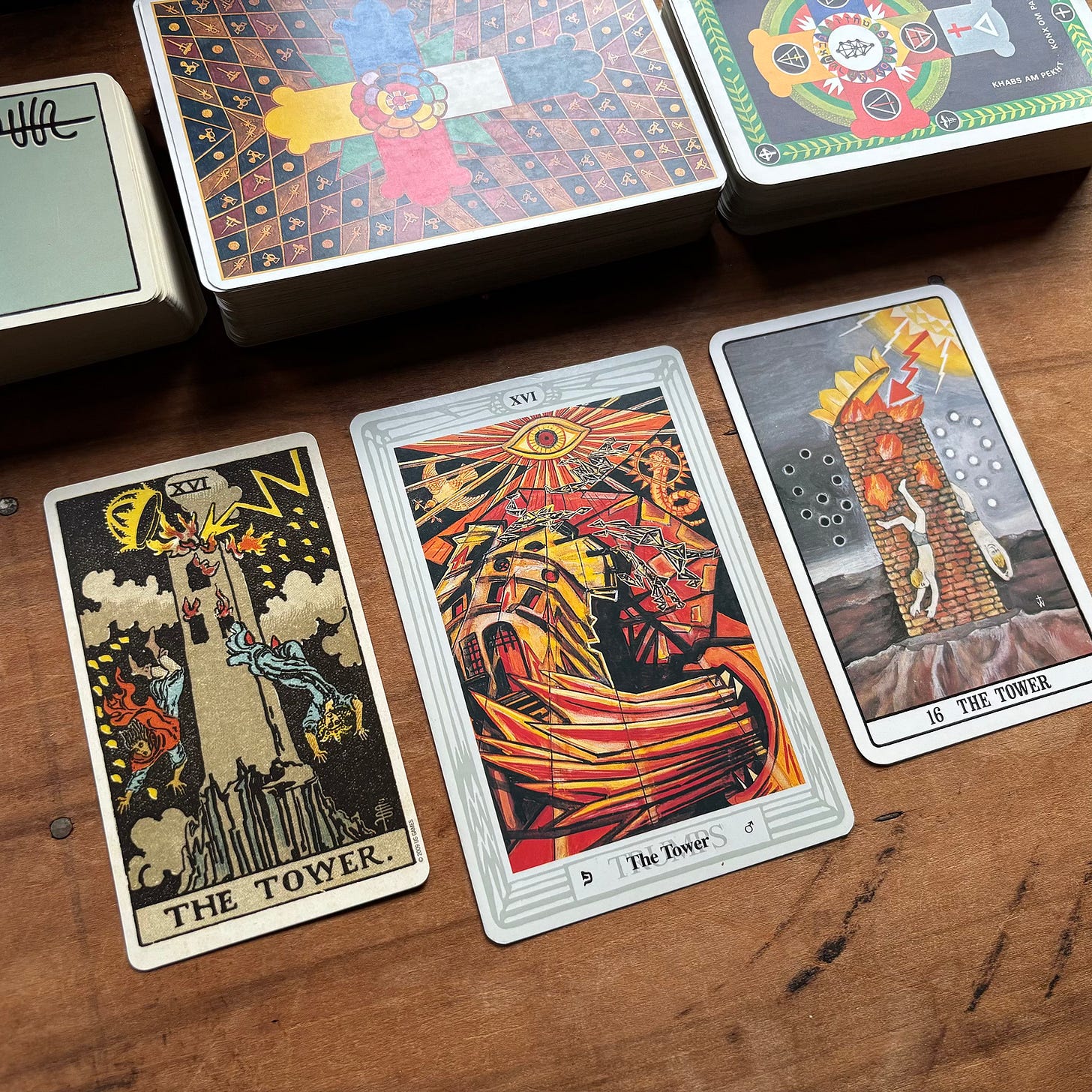  The Tower cards from the Rider-Waite Smith, Thoth, and Golden Dawn tarot decks.