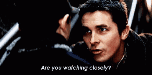 a close up of a man 's face with the words `` are you watching closely '' written below him . a close up of a man 's face with the words `` are you watching closely '' written below him .