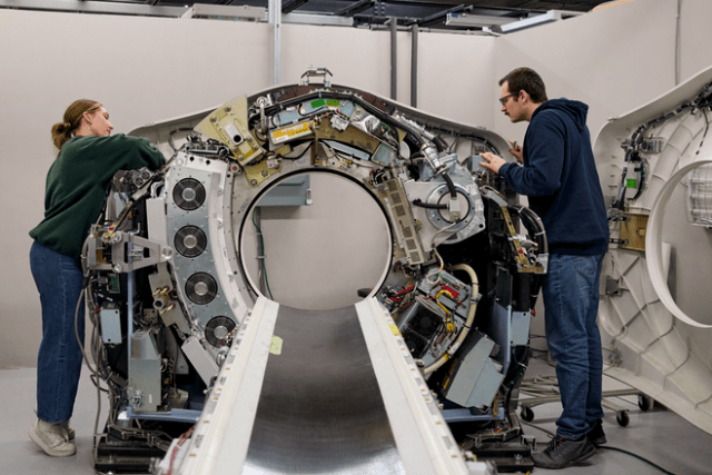 Block Imaging, an Apple Manufacturing Academy participant, hosts forum attendees at its facility for an interactive tour where they can see firsthand how the company has applied learnings from the program.