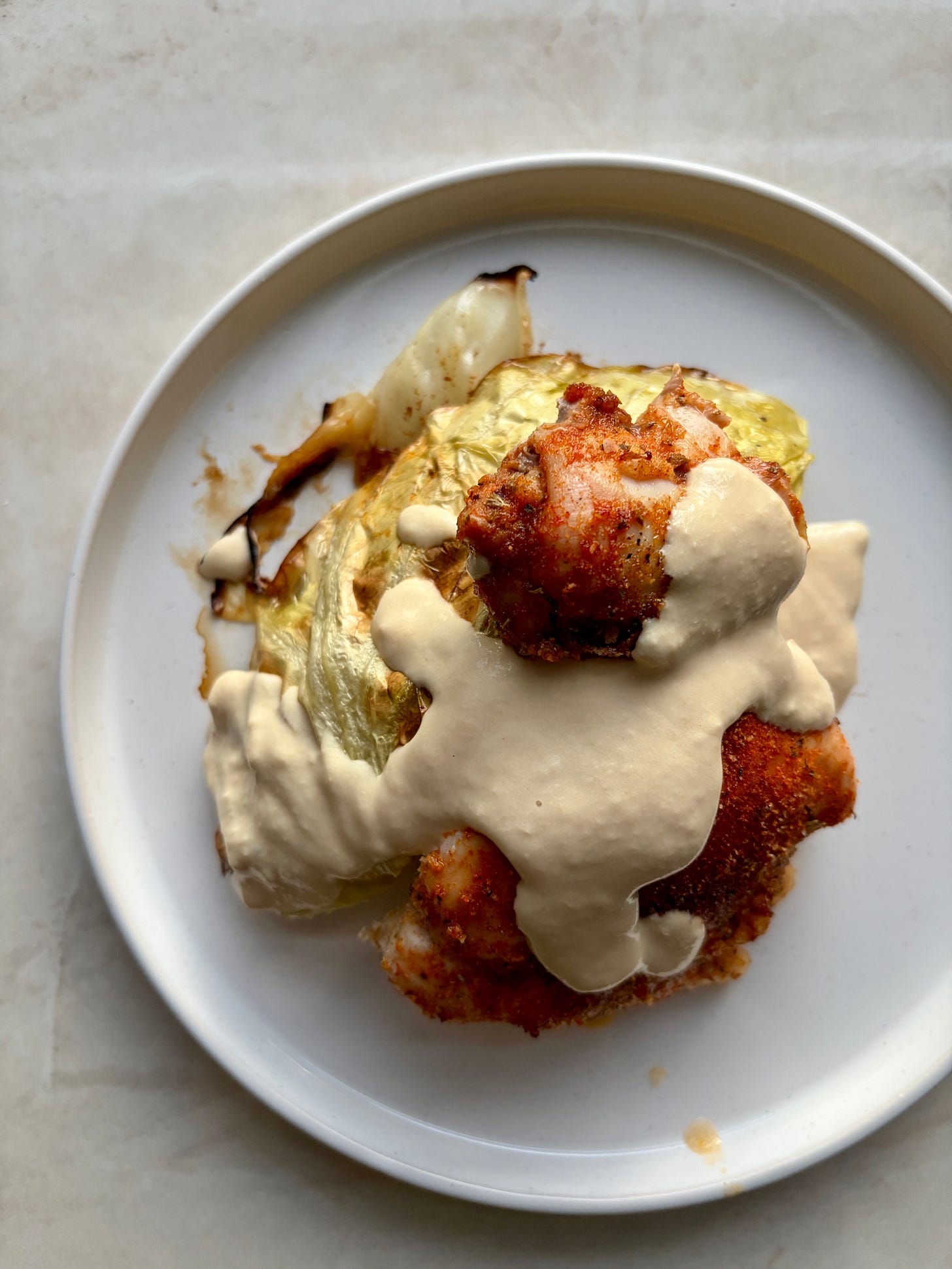Blistered-edge cabbage steaks with blackened chicken & creamy lemon sauce Blistered-edge cabbage steaks with blackened chicken & creamy lemon sauce