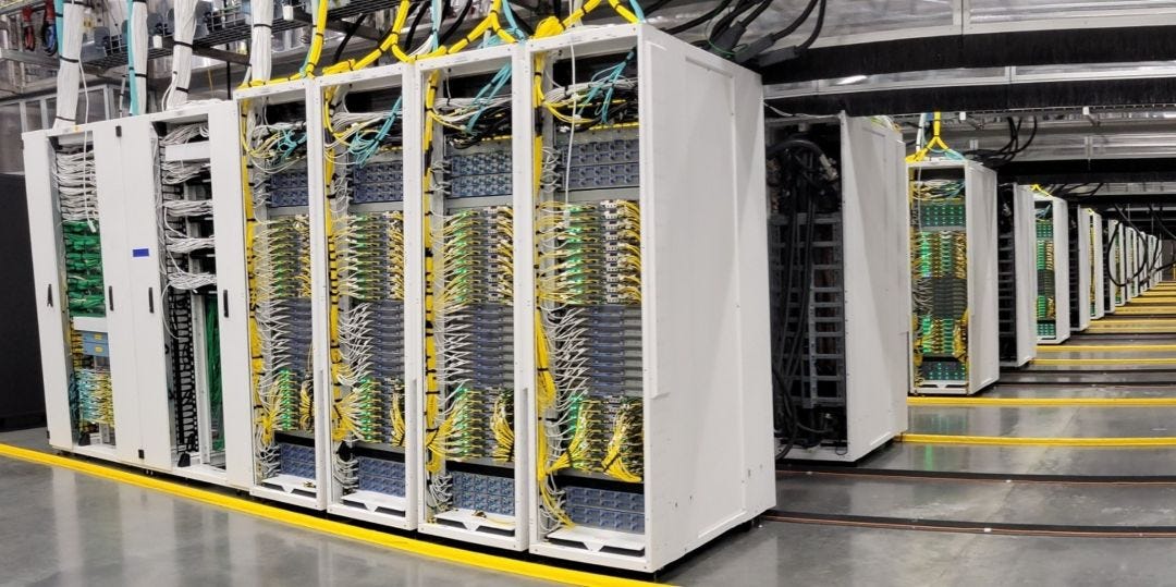 A high-density cluster of AI infrastructure servers in a Microsoft datacenter.