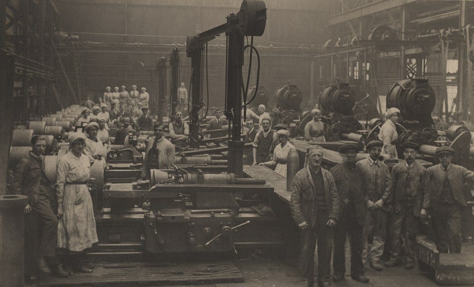 Female munitions workers building shells in armaments factory in WWI ...