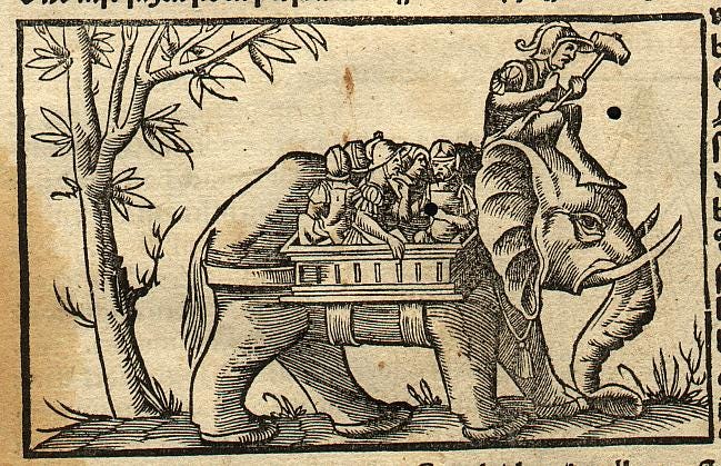Color photograph of a wood engraving of a war elephant