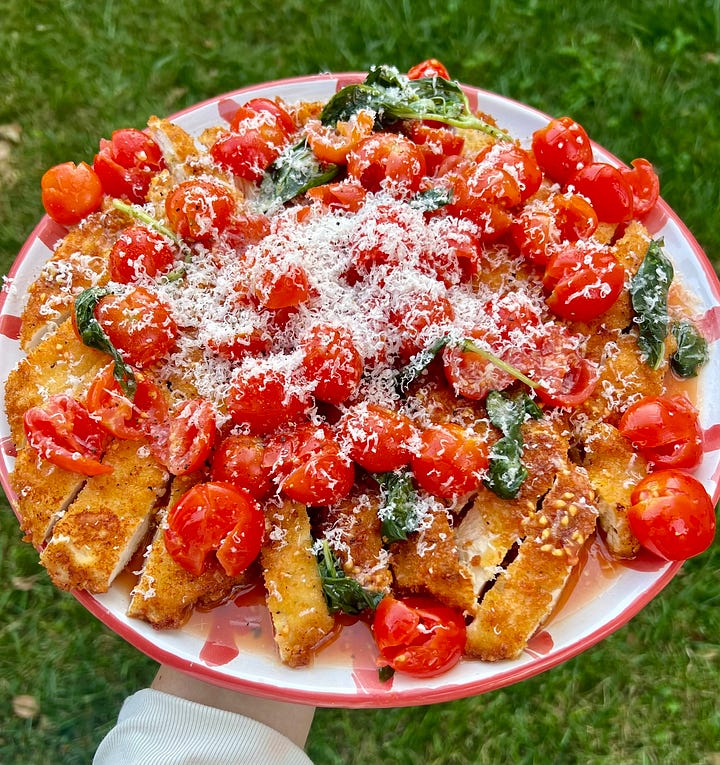photos of summer fried chicken with tomatoes and parm on top
