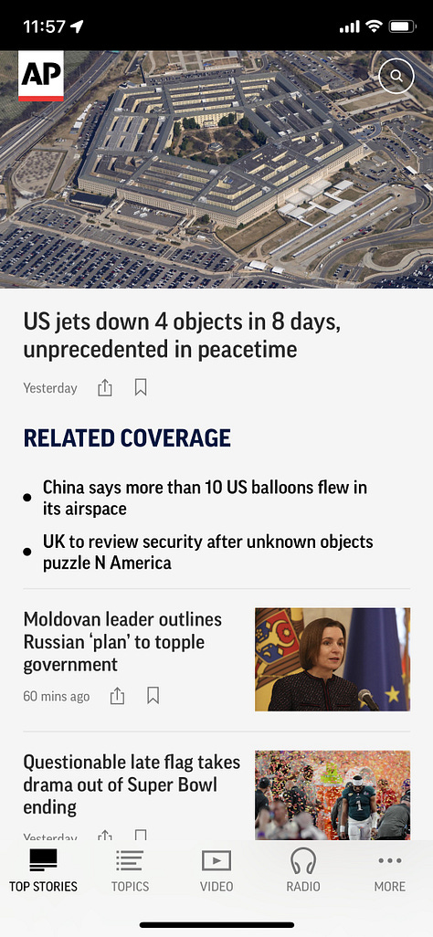 Desktop, smartphone, and smartwatch displays of AP News