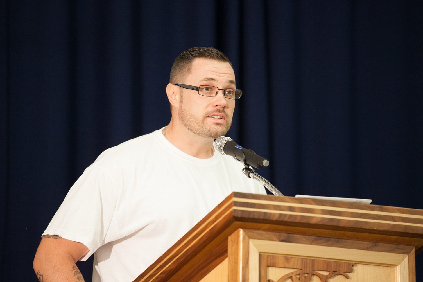 prison journalist christopher blackwell at podium