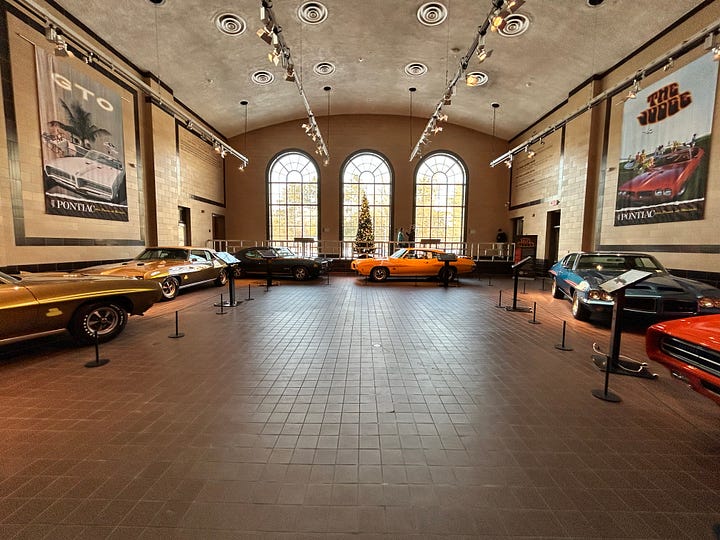 museum, exhibits, galleries, cars, windows, building, sign, geysers, springs