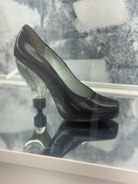 From left: One of Jonathan Anderson's designs for Loewe, a nod to Schiaparelli's lucite shoe from 1930; a shoe made from Jan Ernst Matzeliger's invention that revolutionalized the footwear industry in the late 1800s; the RAPCO Satellite Spring Shoes, also known as "moon shoes" that were patented in 1968.